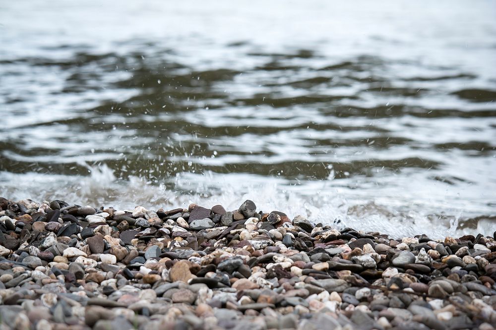 Stones on beach. Free public domain CC0 image.