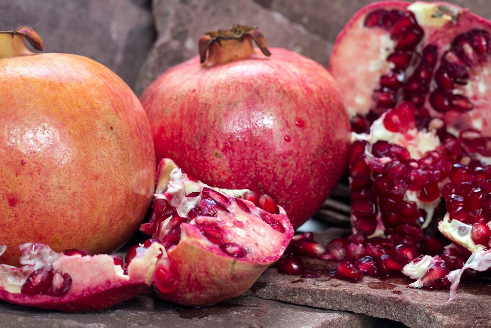 Fresh open pomegranate fruit. Free public domain CC0 image. 