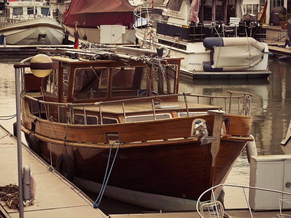 Yachts docking at marina. Free public domain CC0 photo.