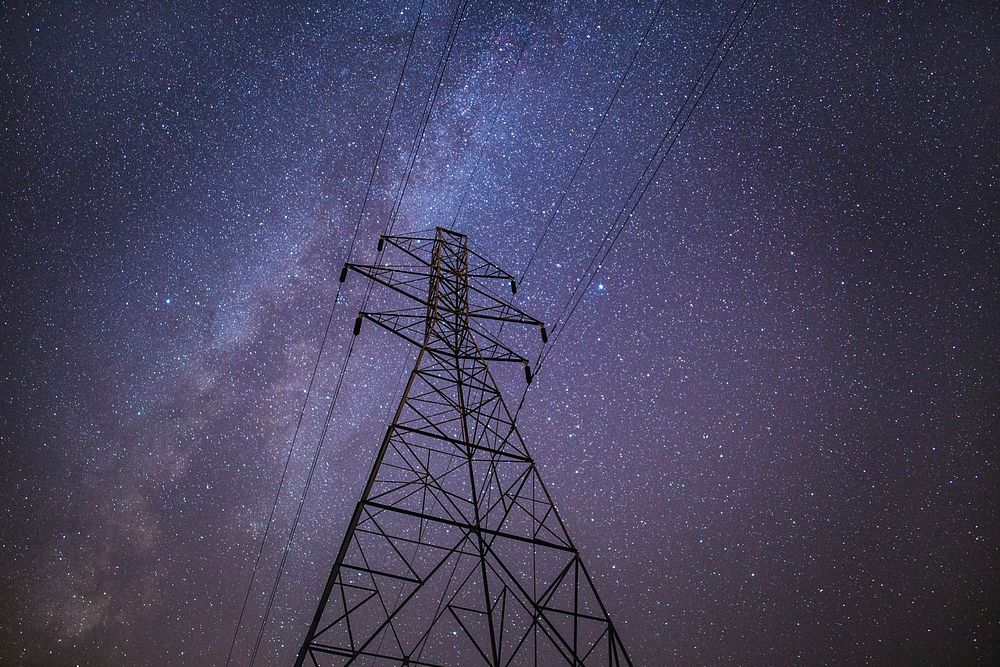 Power lines on electric transmission at night. Free public domain CC0 photo.