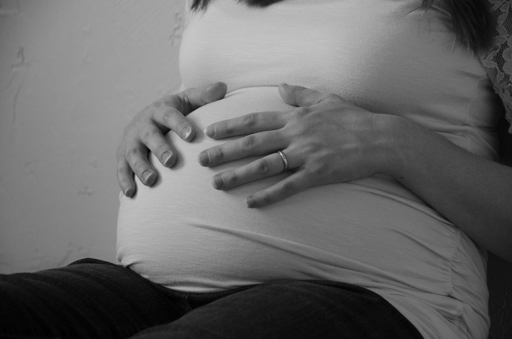 Pregnant woman and belly. Free public domain CC0 photo.