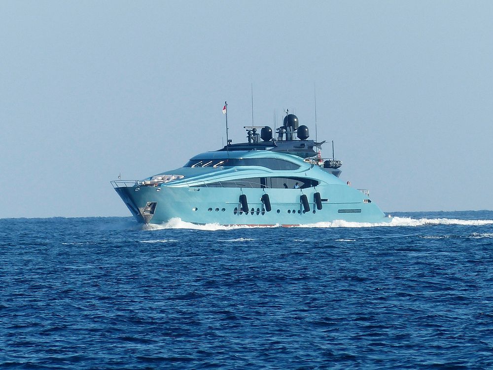 Yacht sailing in the sea. Free public domain CC0 photo.