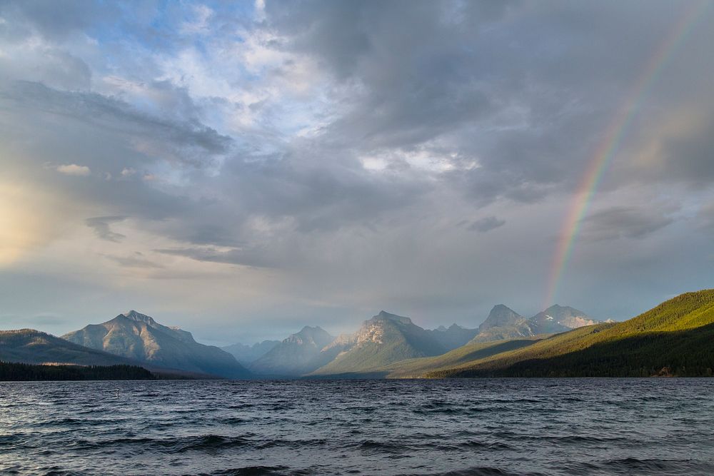 Rainbow over Lake McDonald scenery. Free public domain CC0 image.