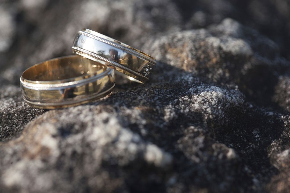 Wedding ring on stone. Free public domain CC0 image.