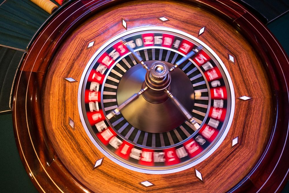 Roulette casino game, gambling addiction. Free public domain CC0 photo.