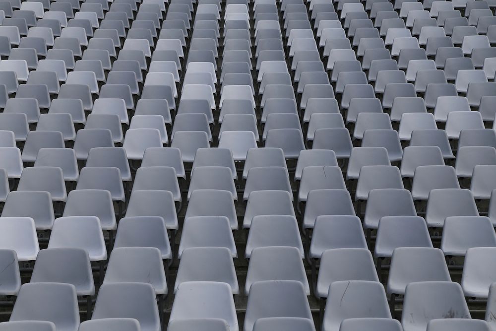 Gray seats in arena. Free public domain CC0 photo.