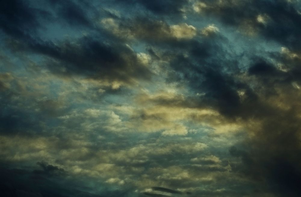 Dark cloudy sky background. Free public domain CC0 photo.
