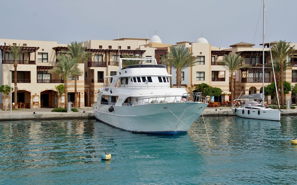 Yacht docking by the marina. Free public domain CC0 photo.