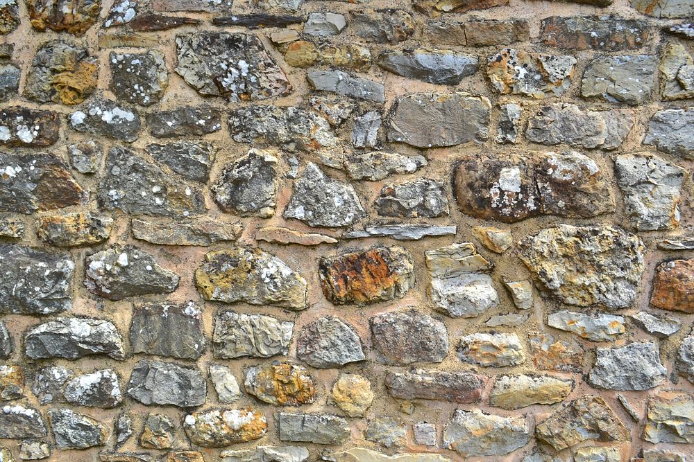 Stone wall texture background. Free public domain CC0 photo.