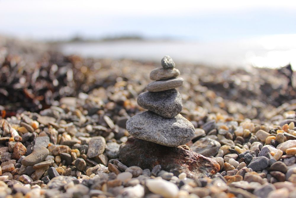 Balancing stones on beach. Free public domain CC0 photo