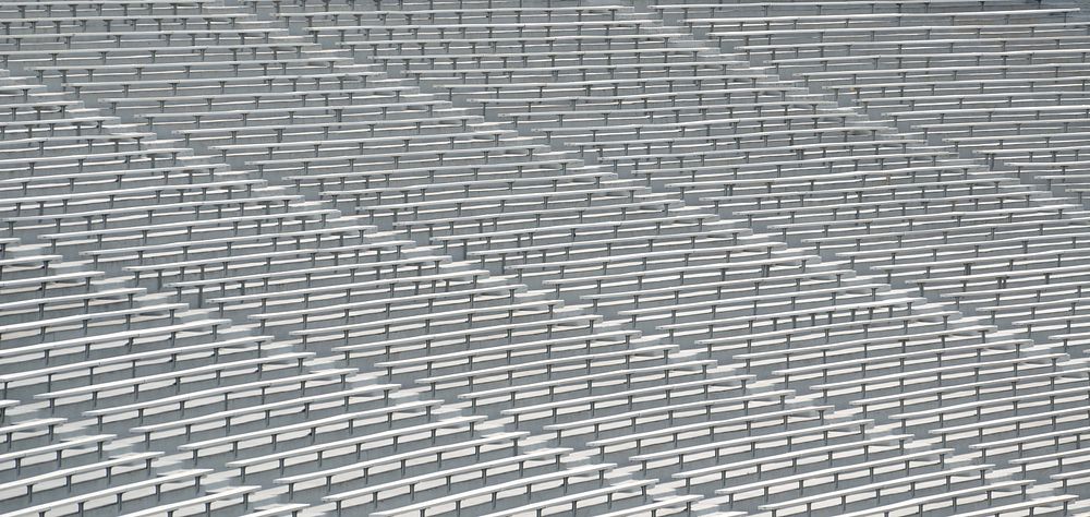 White searts in arena. Free public domain CC0 photo.