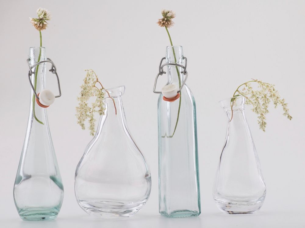 Dried flowers in glass vases. Free public domain CC0 photo