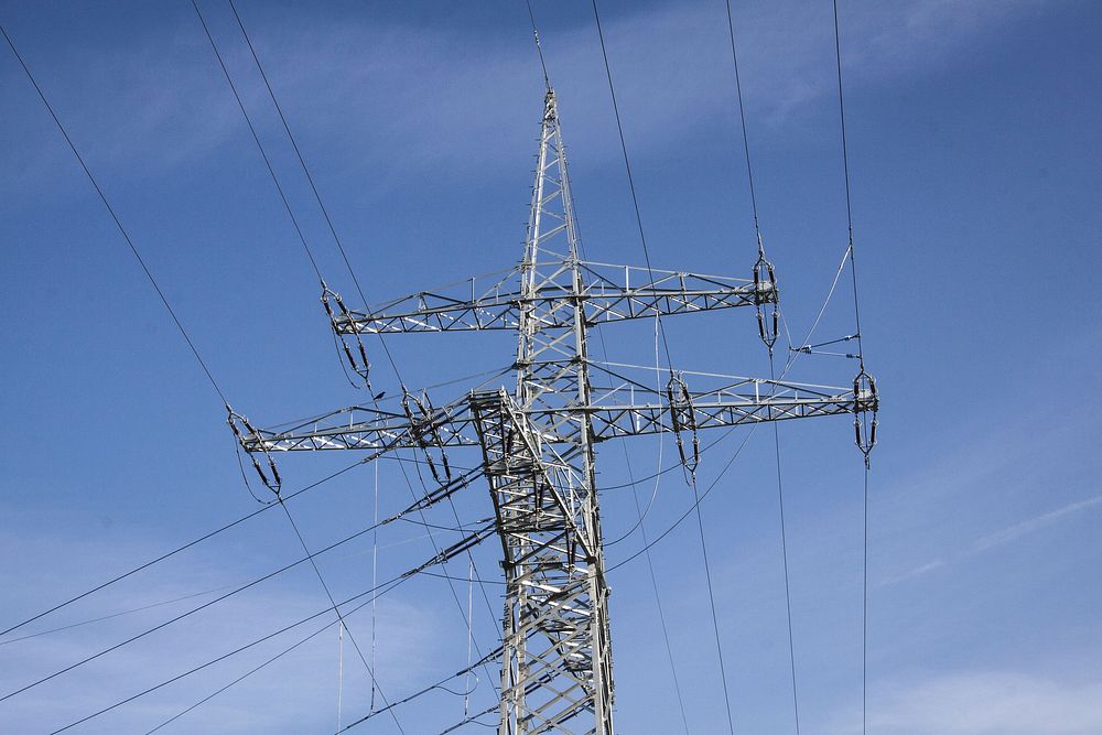 Electric transmission tower power lines. Free public domain CC0 photo.