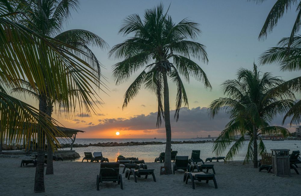 Beautiful empty beach sunset. Free public domain CC0 image.