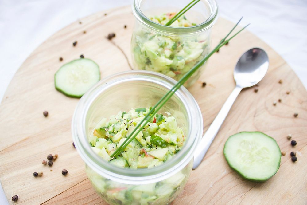 Free cucumber and avocado in glass jar photo, public domain vegetables CC0 image.