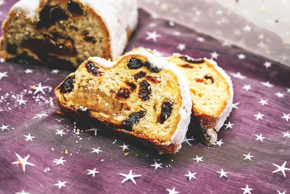 Free slice Christmas blueberry stollen image, public domain food CC0 photo.