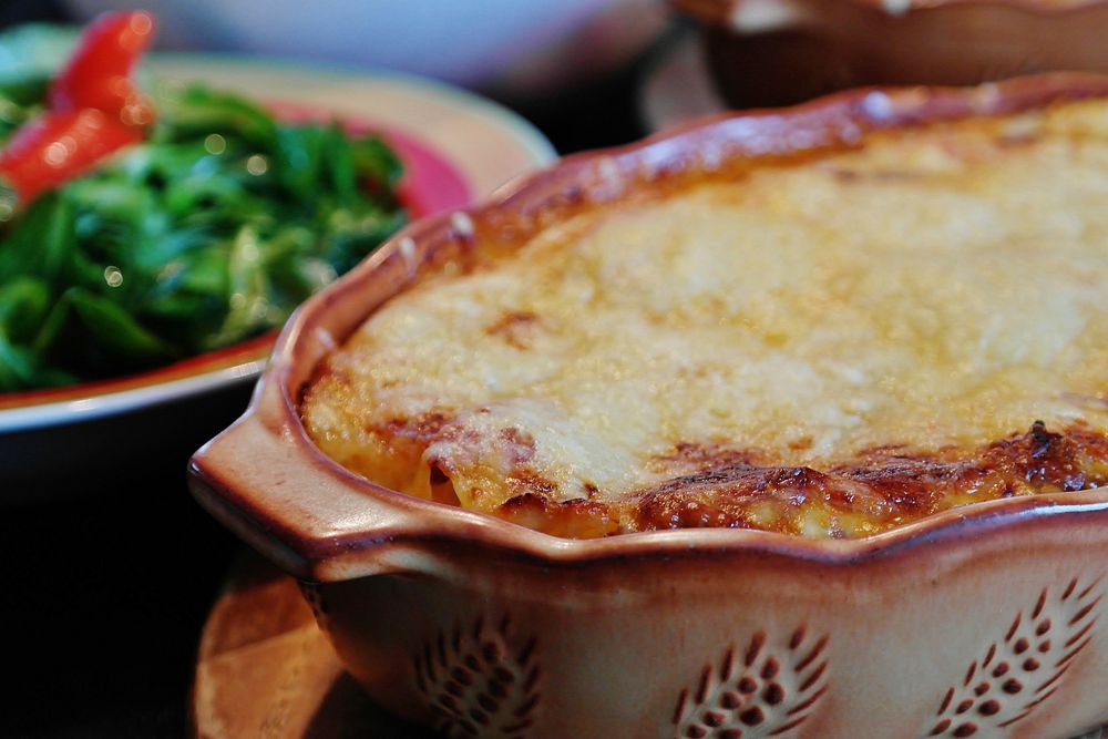 Free baked lasagna in bowl image, public domain food CC0 photo.