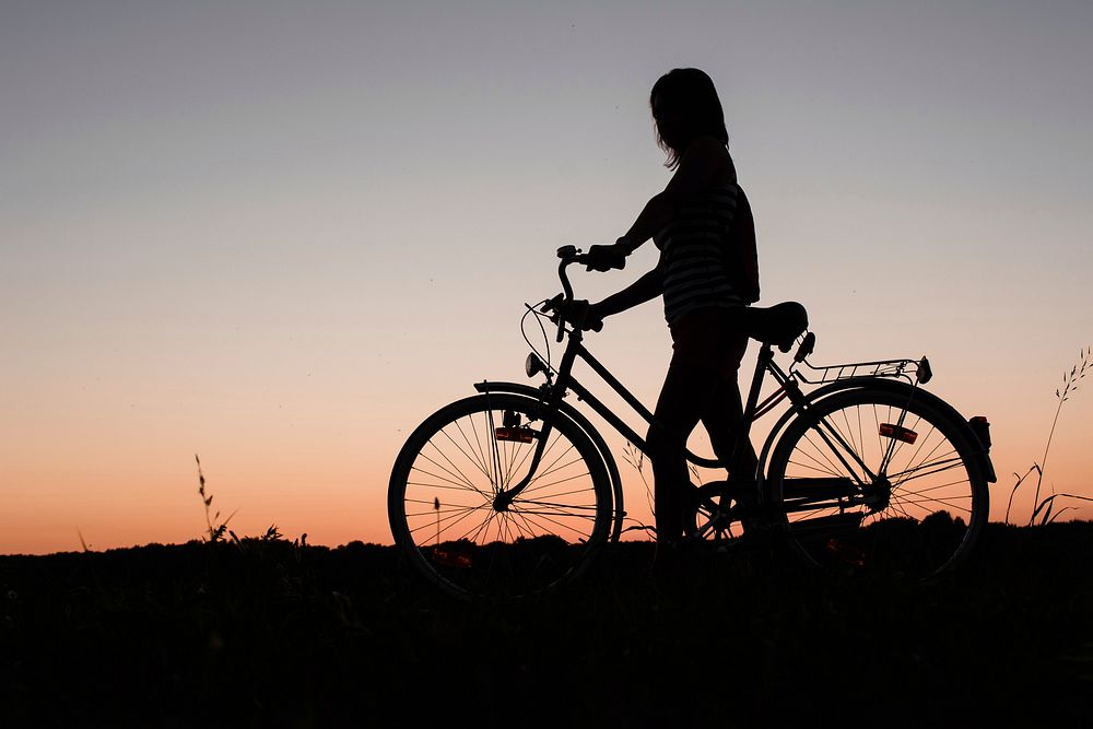 Free girl with cycle silhouette image, public domain vehicle CC0 photo.