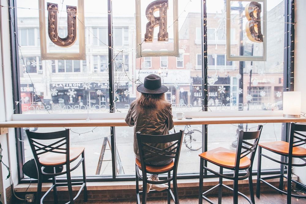 Free woman chilling in a coffee shop image, public domain lifestyle CC0 photo.