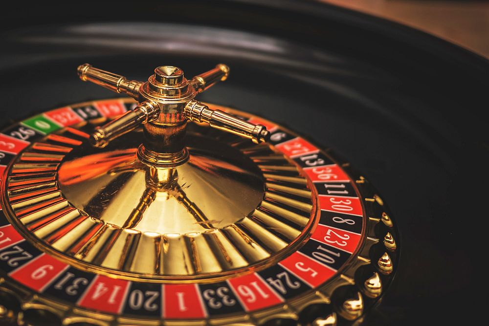 Casino roulette wheel close up, free public domain CC0 photo.