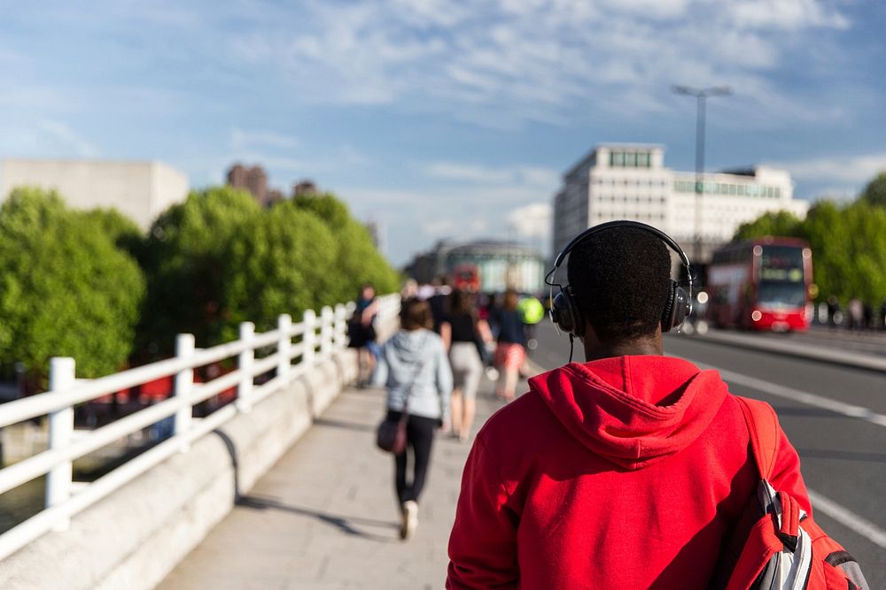 Free red hoodie man listening to music image, public domain human CC0 photo.