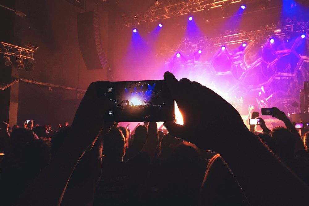 Free a person recording a video in a concert with mobile phone image, public domain CC0 photo.