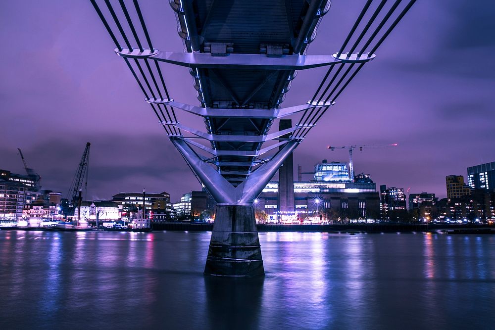 Purple led light under the bridge over the river, free public domain CC0 photo.