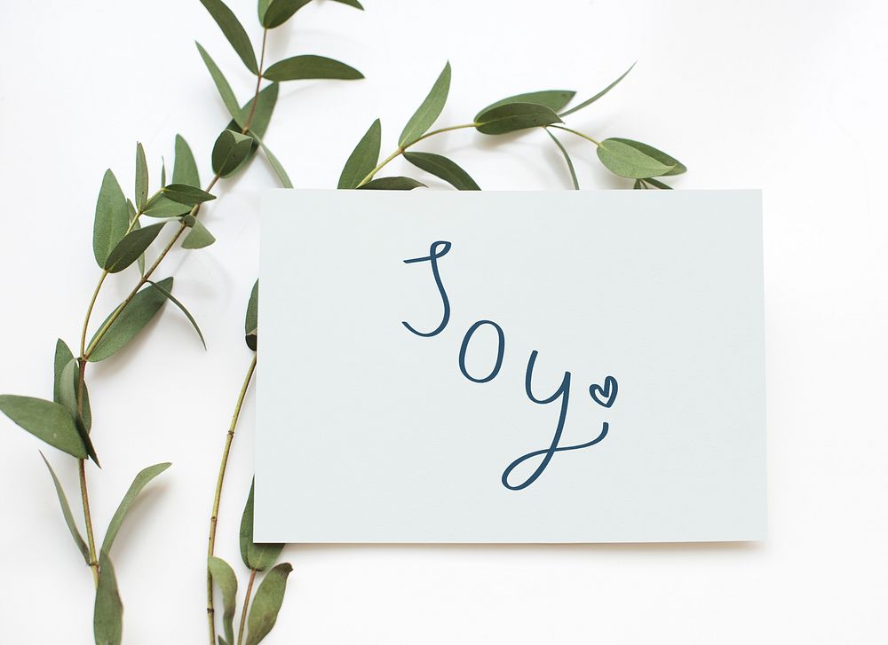 Card with a text Joy in plant decoration