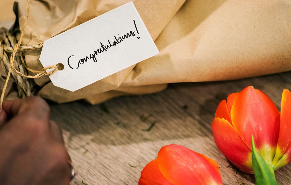 Closeup of Congratulations tag on a flower bouquet