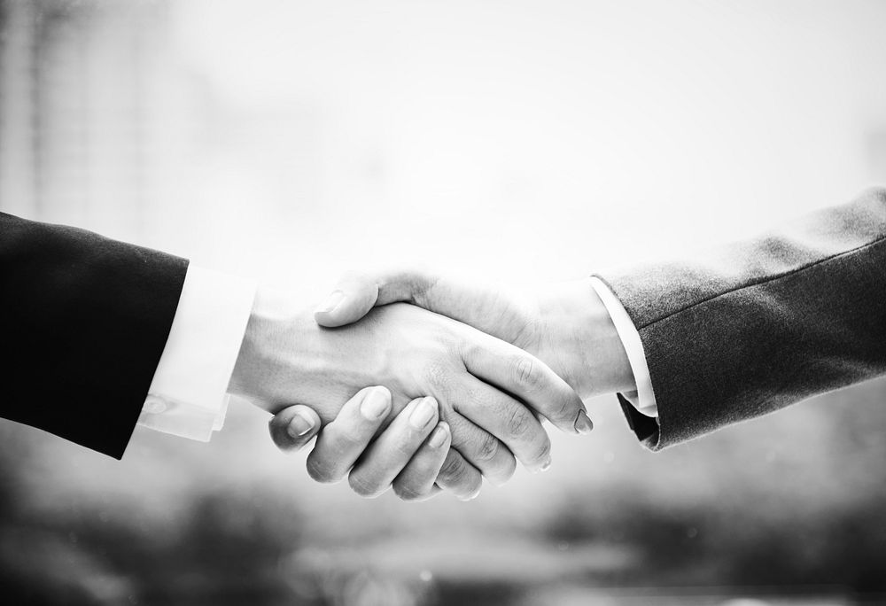 A close up of a business handshake