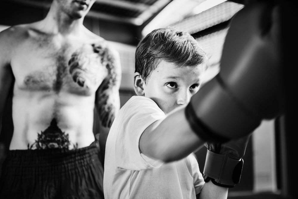 Young boy in boxing training