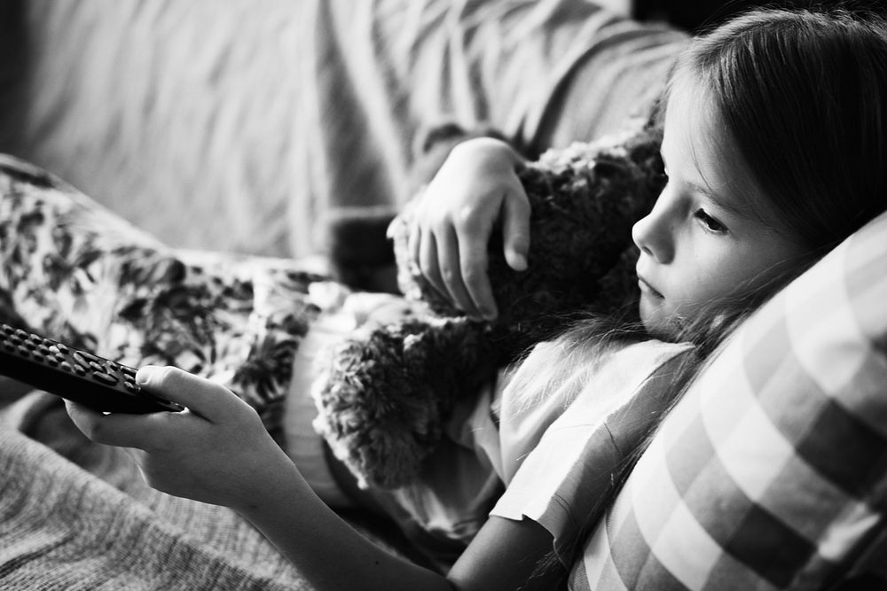 Young girl laying on the couch