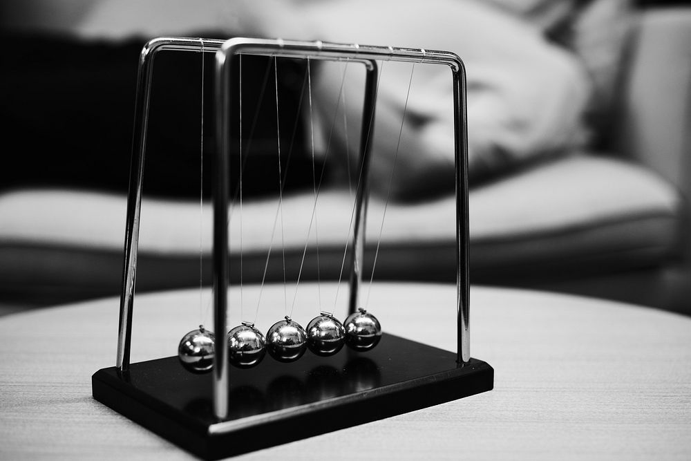 Closeup of Newton's cradle in a psychologist room