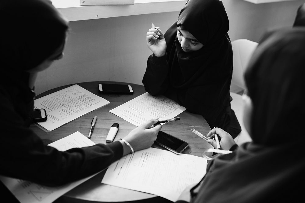 Diverse muslim girls studying in a classroom