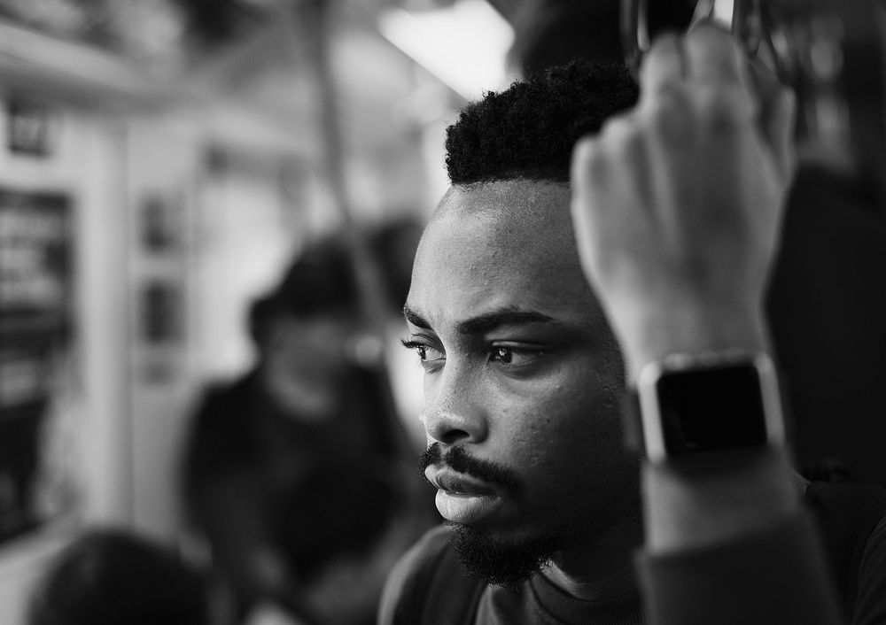 Young african man on a train