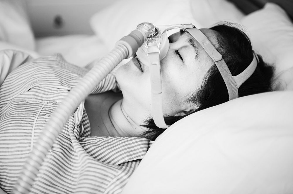 Woman wearing an oxygen mask