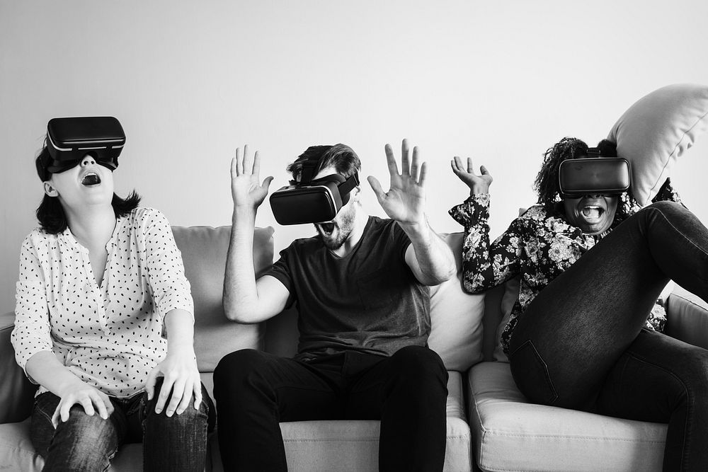 Group of diverse friends experiencing VR
