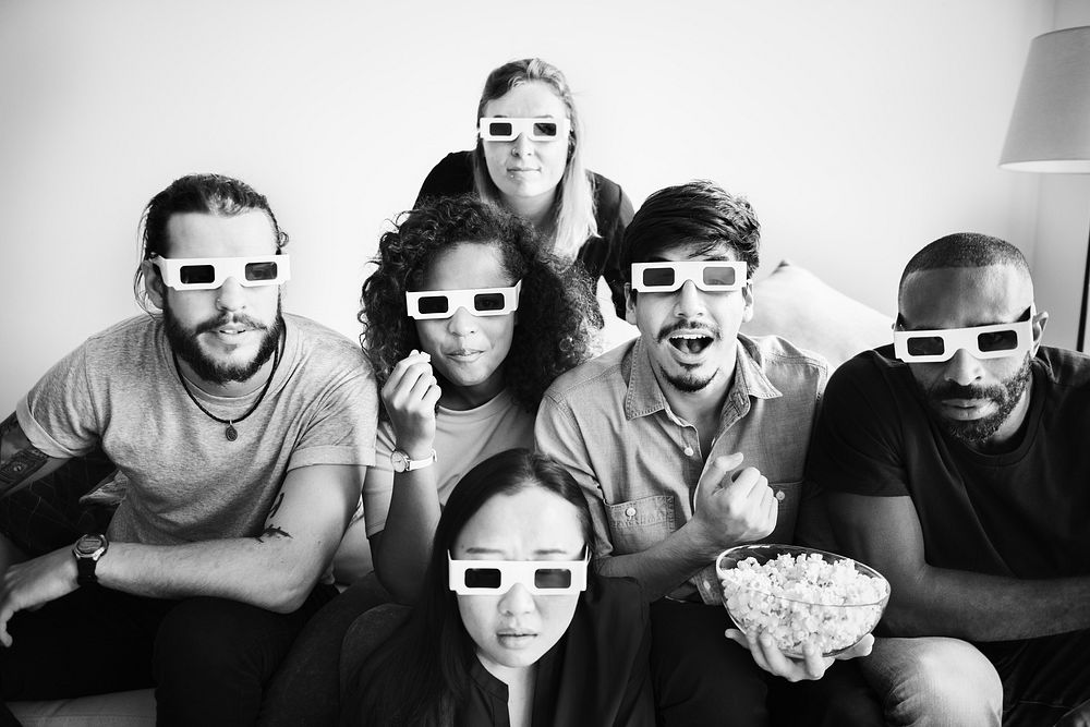 Group of friends watching 3D movie together