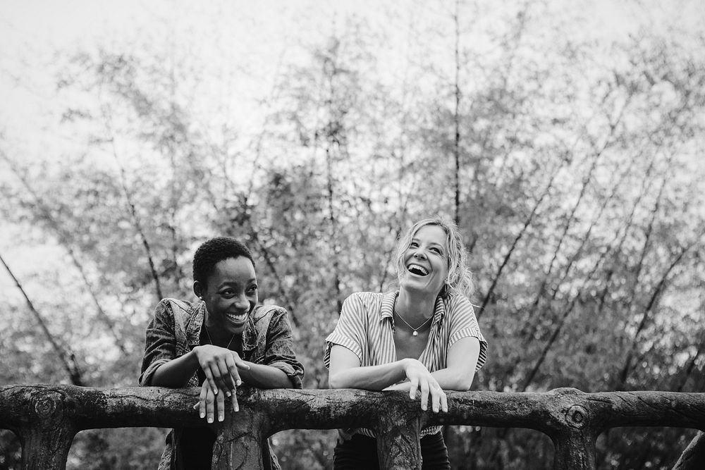Two women friends talking outdoors