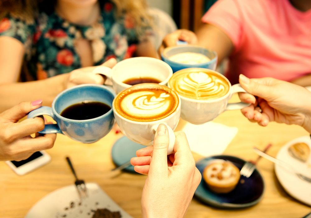 Friends having coffee at a cafe