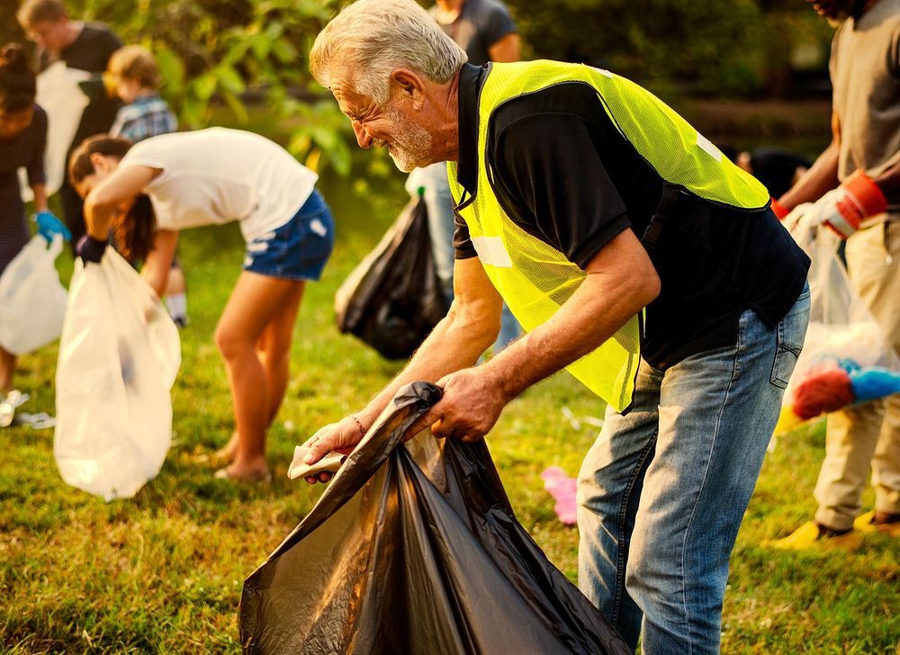 Volunteers picking trash at a park