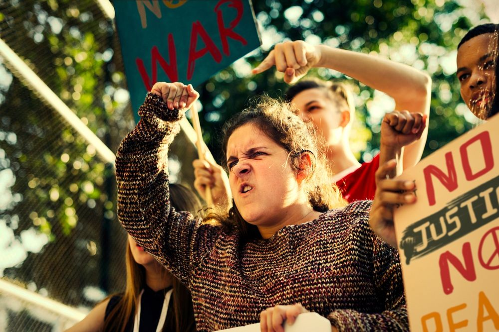 Young rebels protesting against war