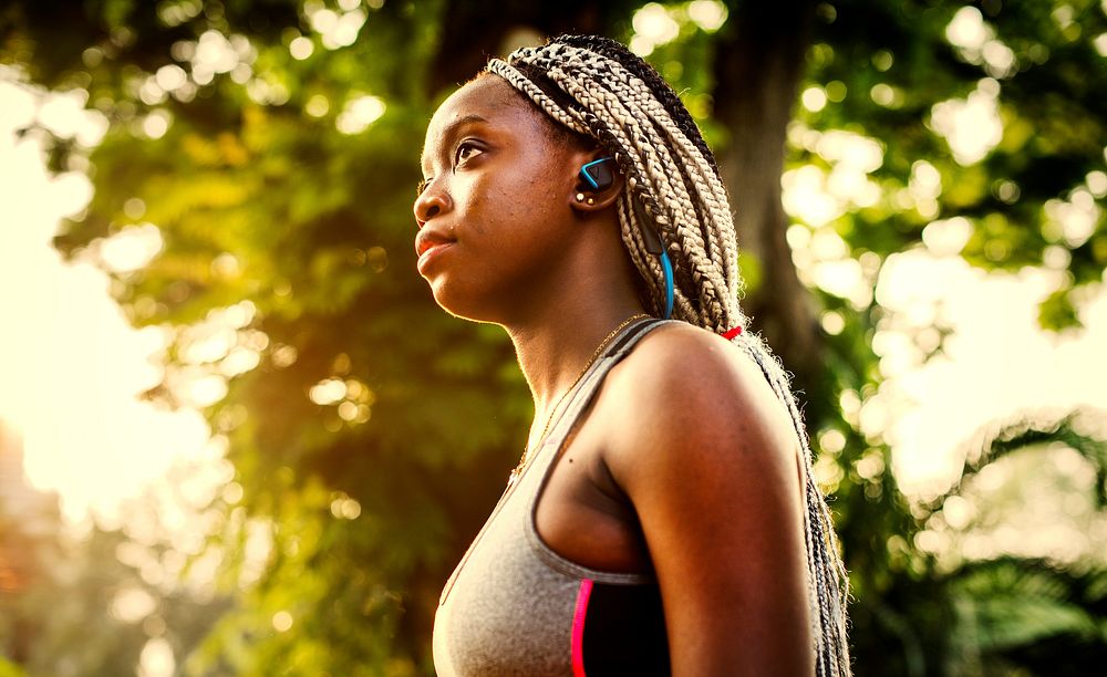 Fit and sporty woman with braids