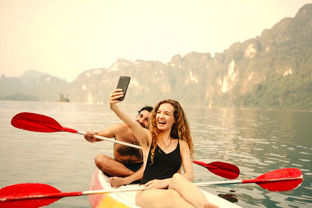 Couple paddling in a canoe