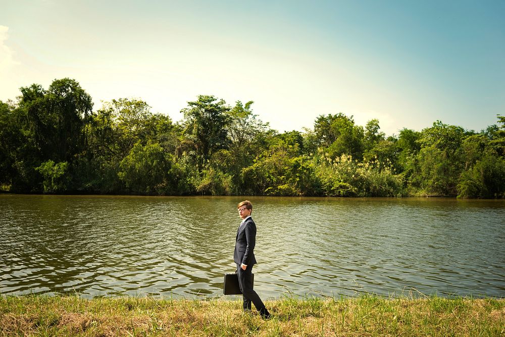 Businessman lost in the nature