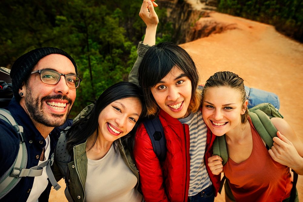 Friends taking a selfie while hiking