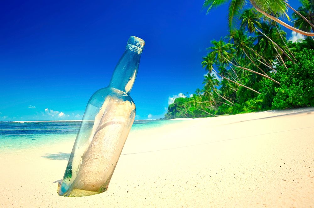 Message in a bottle at a tropical beach on Samoa