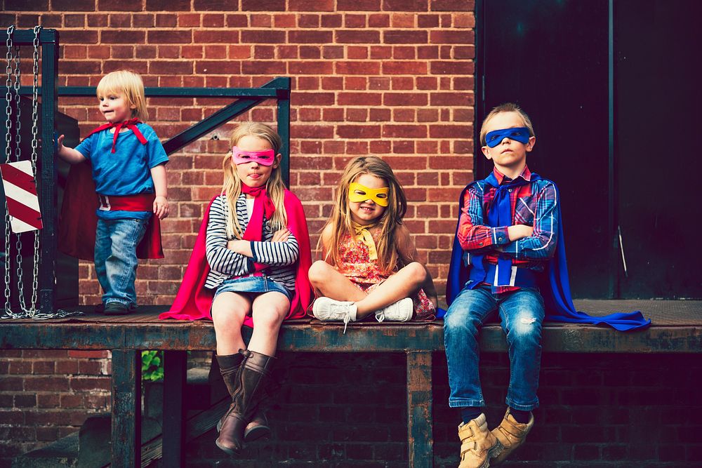 Kids dressed up as superheroes