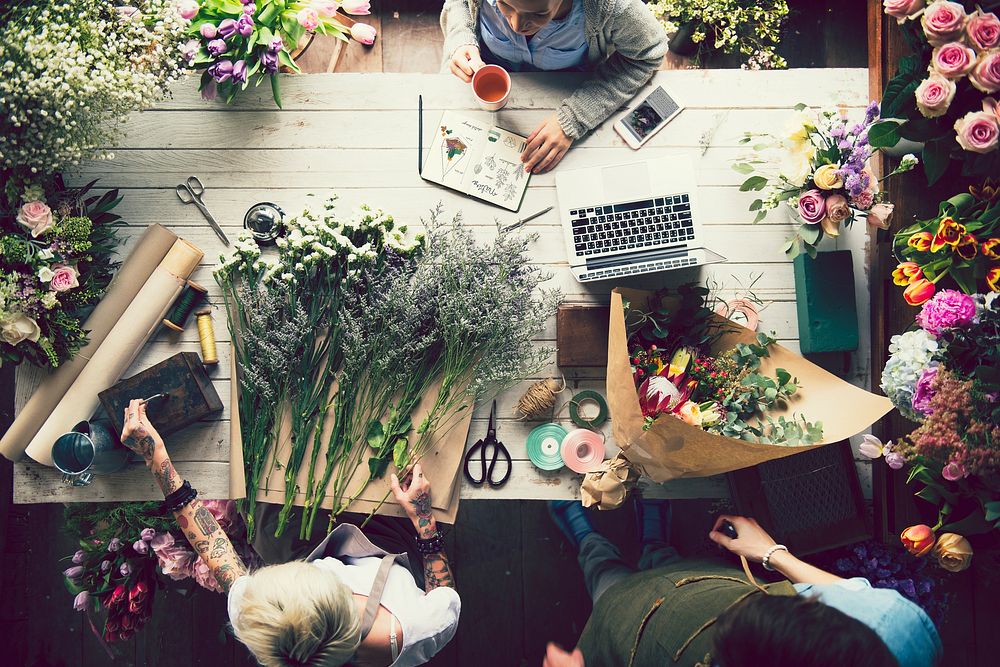 People working in a flower shop