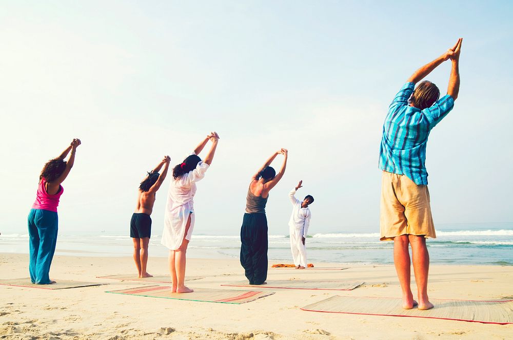 Yoga class on the beach